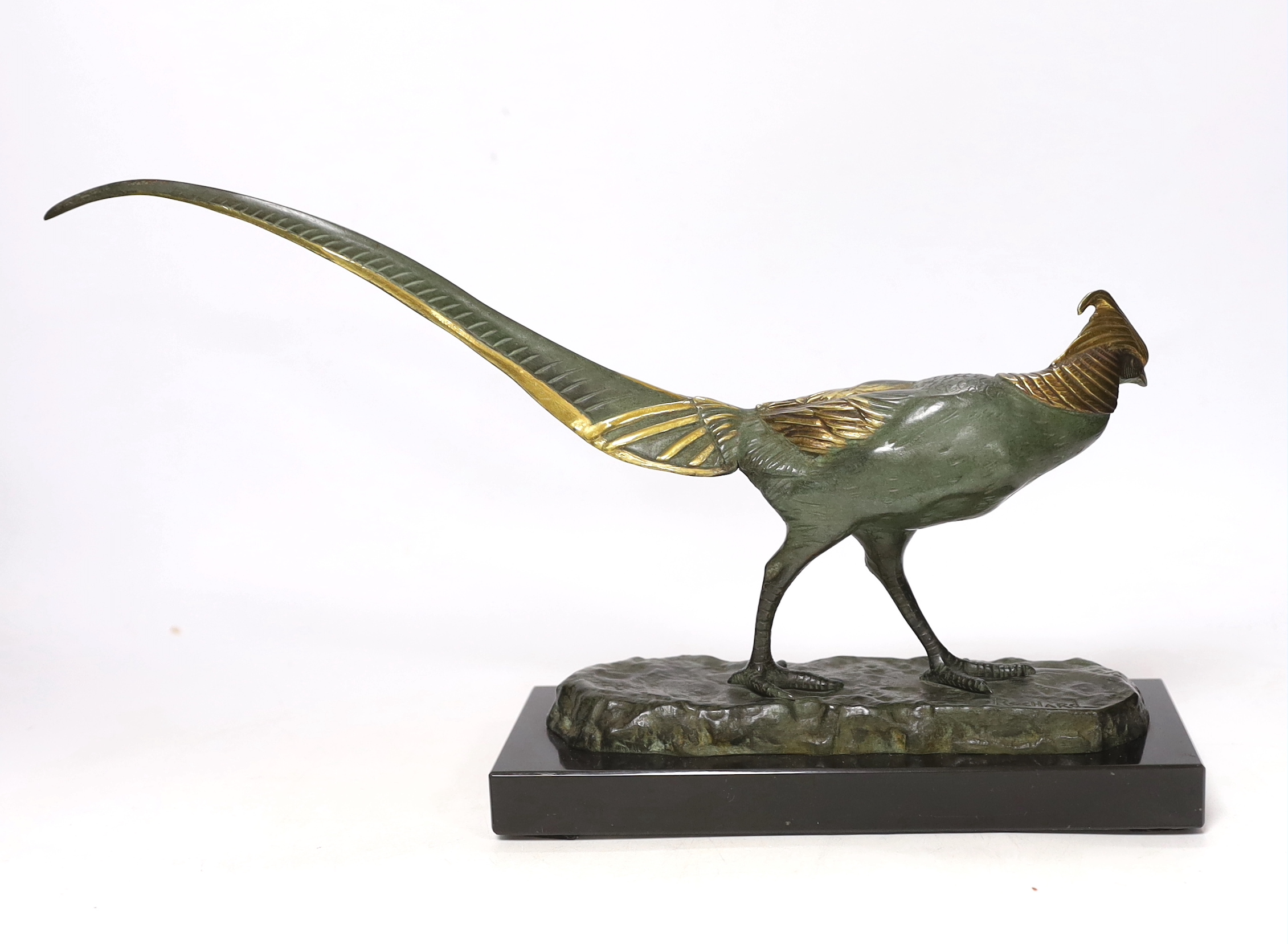 Irénée Rochard (1906-1984), an Art Deco patinated bronze of a pheasant, partially gilt, signed, 36cm wide